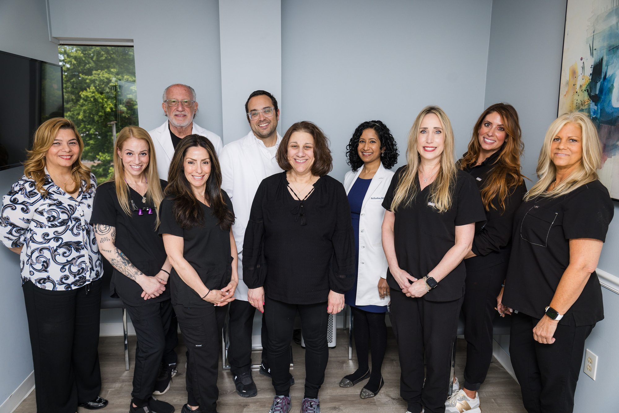 The Morganville Dentistry team standing together in the office
